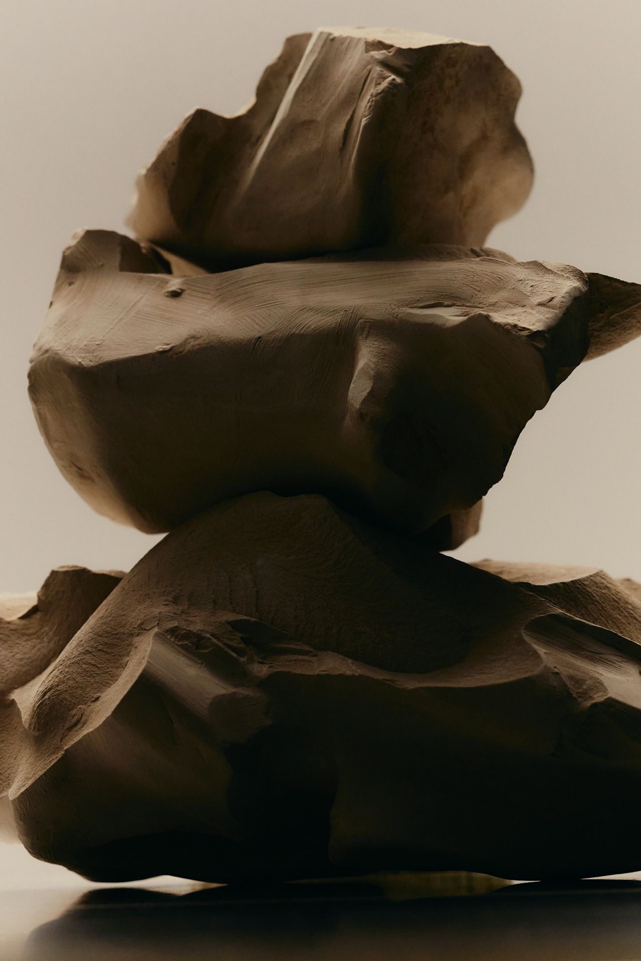 Stones on top of each other in the shadow