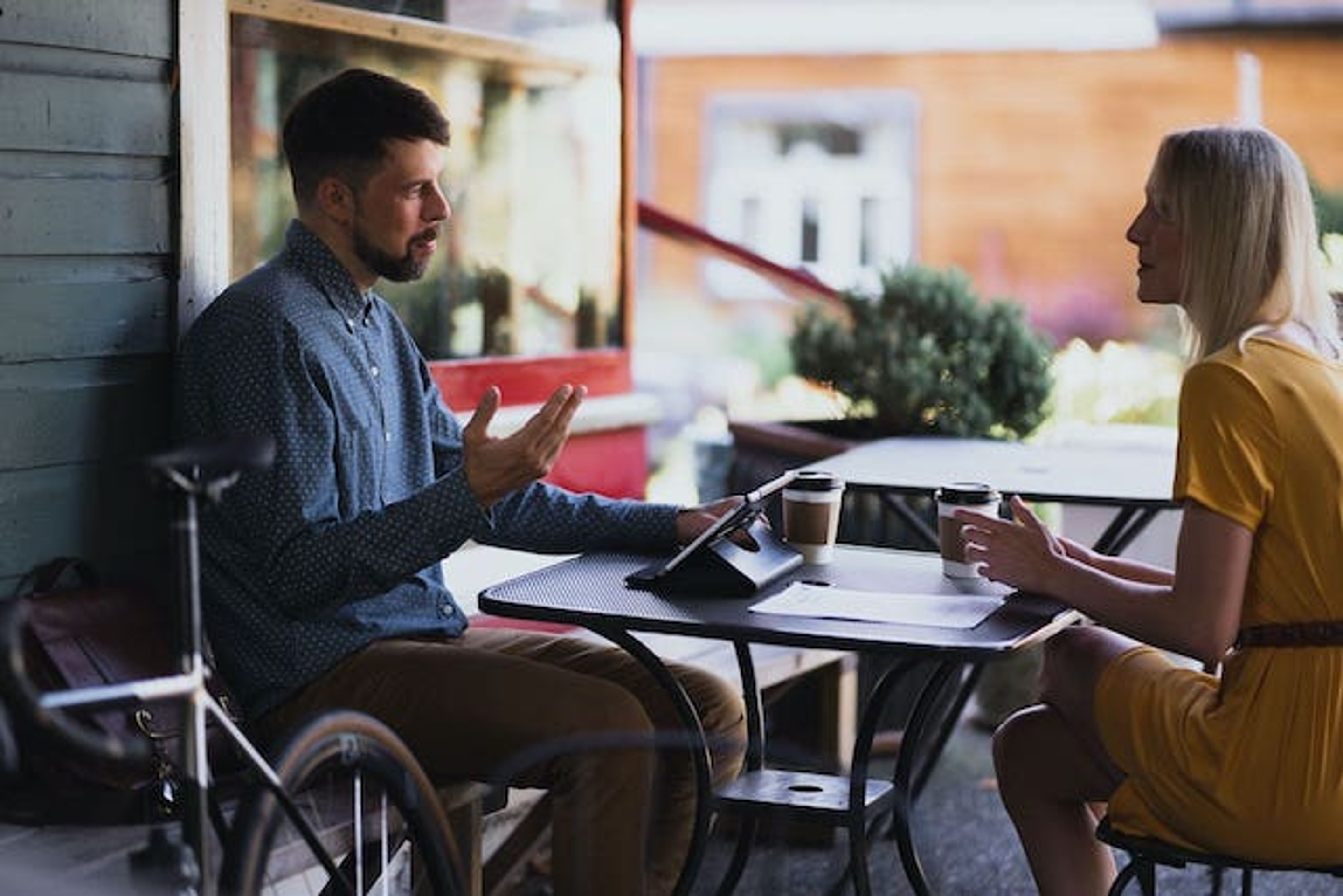 Bicycle Broker reviewing coaching insurance with a mountain bike instructor