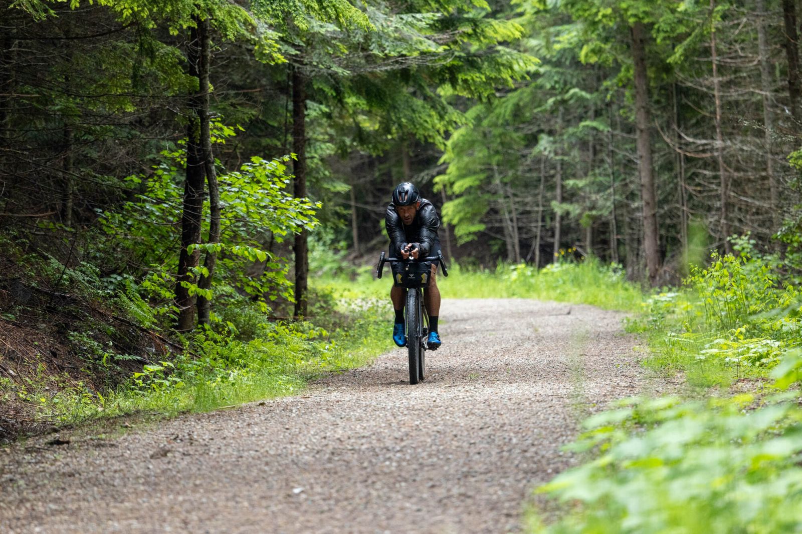 Professional ultra-endurance cyclist Svein Tuft on his bike during the 2024 BC Epic 1000 record attempt, showing the moment he set fastest known time records.
