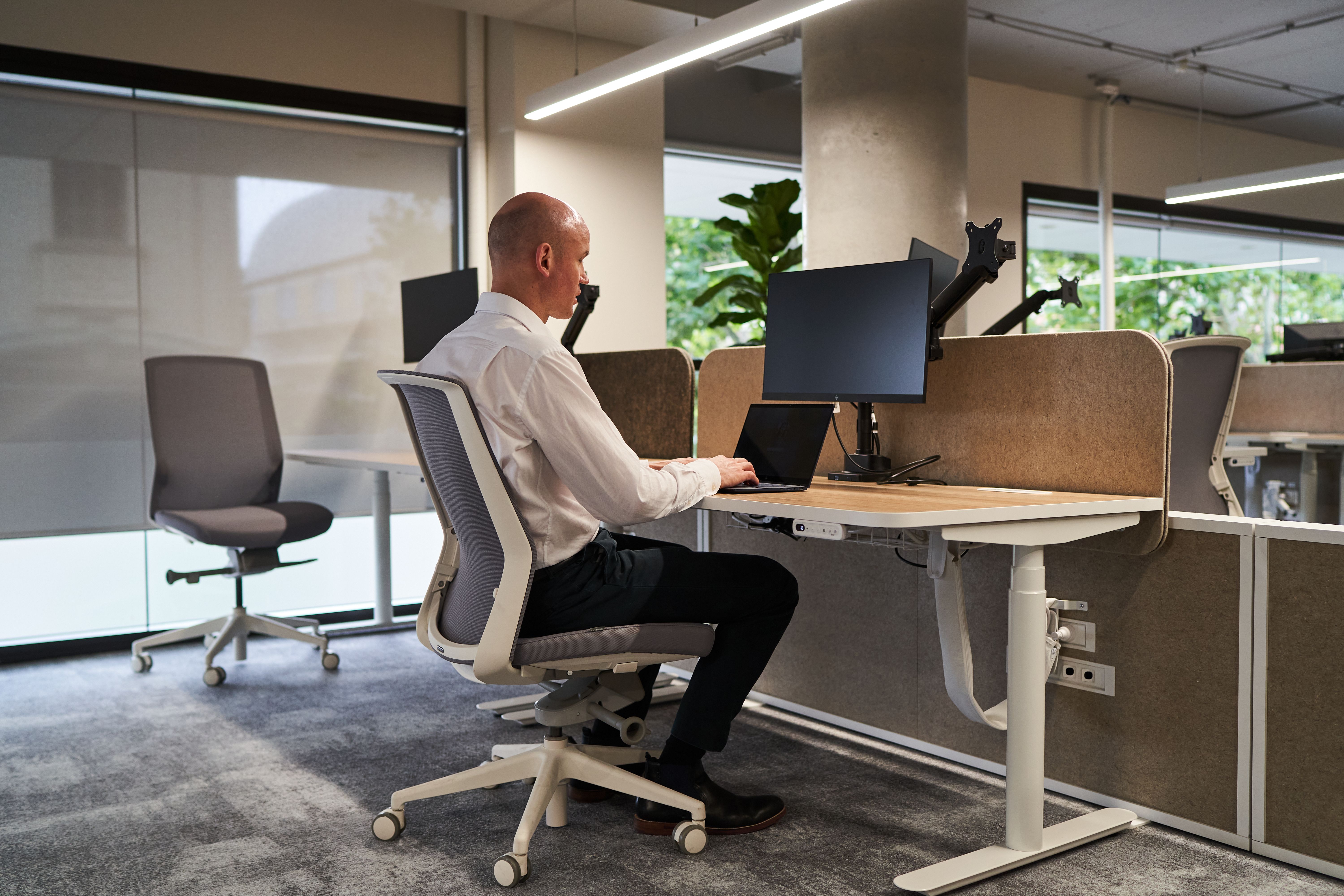 Ben Moxey sitting at a computer.