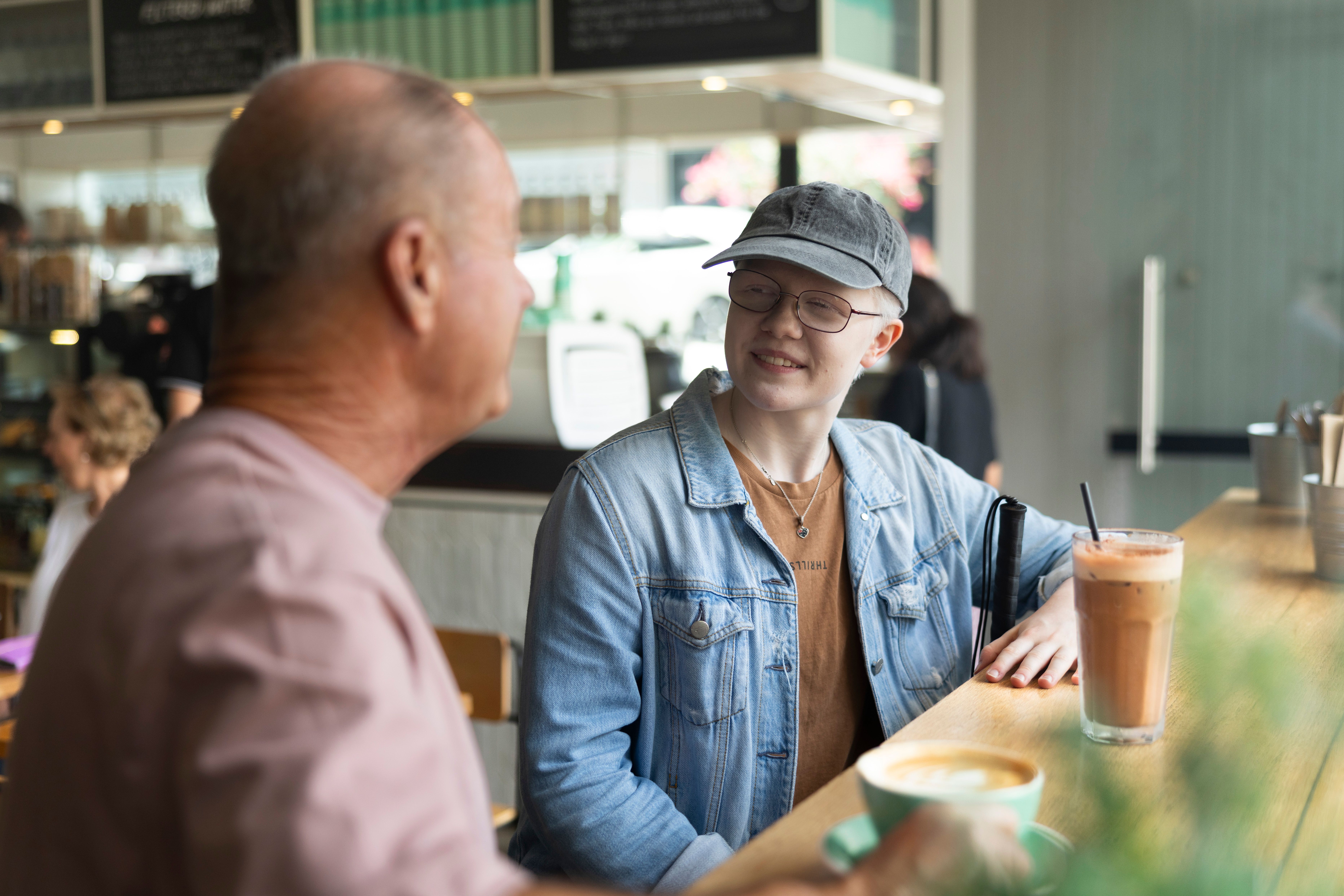 A Client sitting at a cafe.