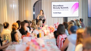 Presenters presenting at the summit.