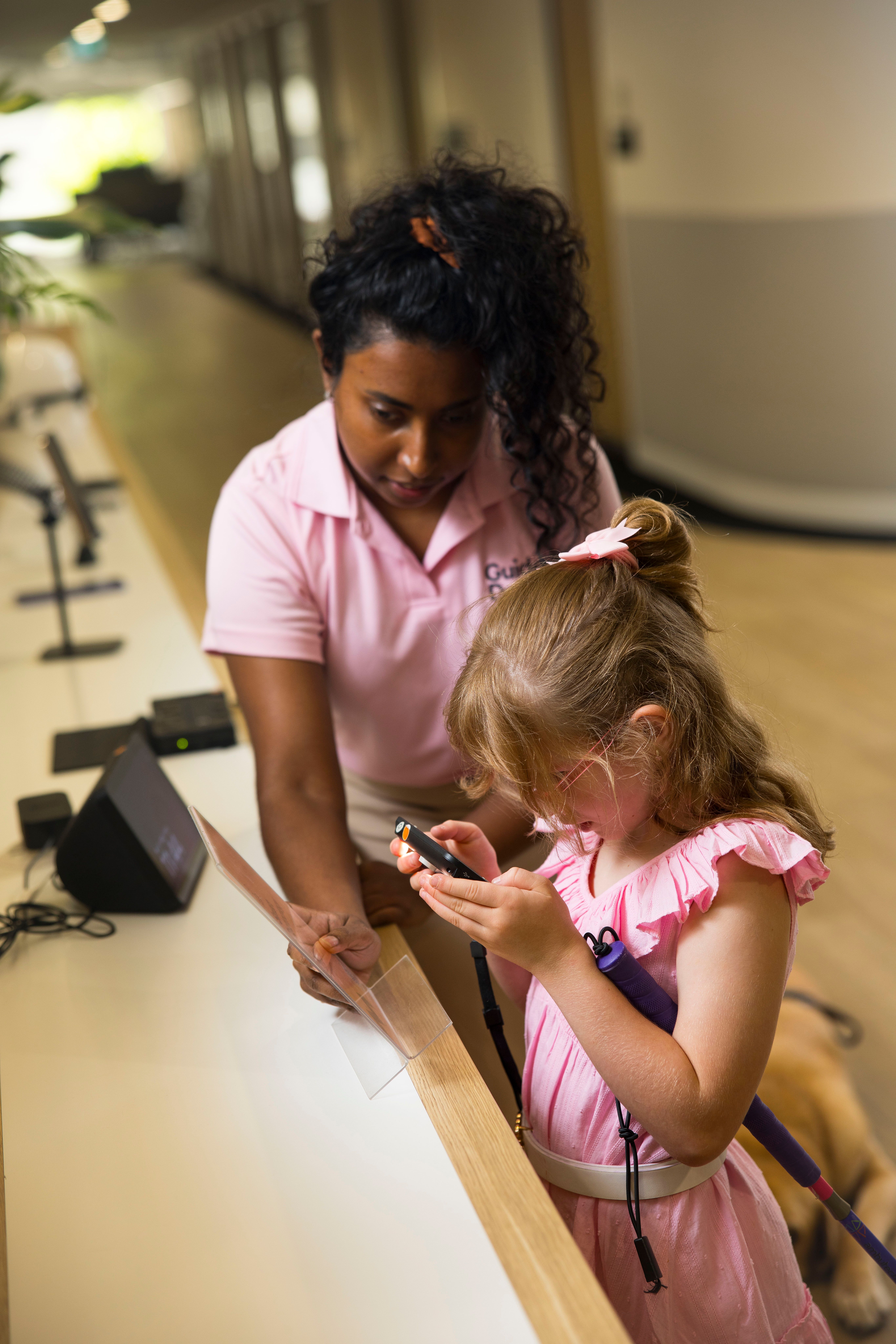 Assistive Technology Specialist Abby with a Client. 
