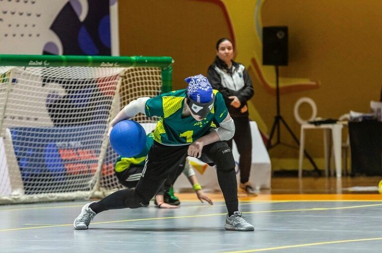 Zara playing Goalball.