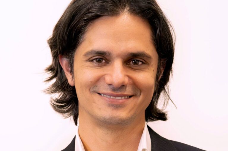 Ashley de Silva smiling.