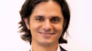 Ashley de Silva smiling.