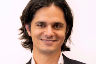Ashley de Silva smiling.