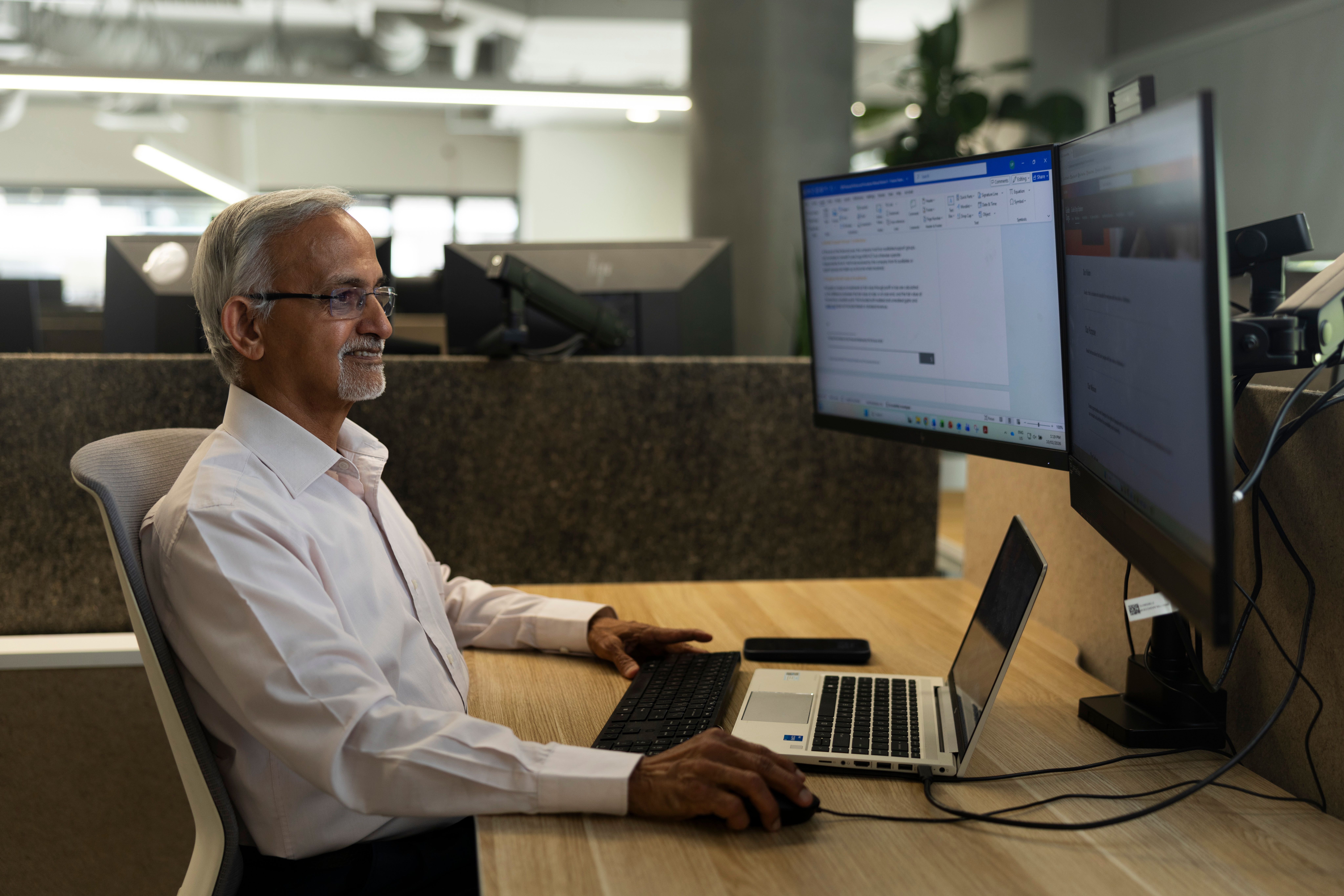 Finance Volunteer at his computer. 