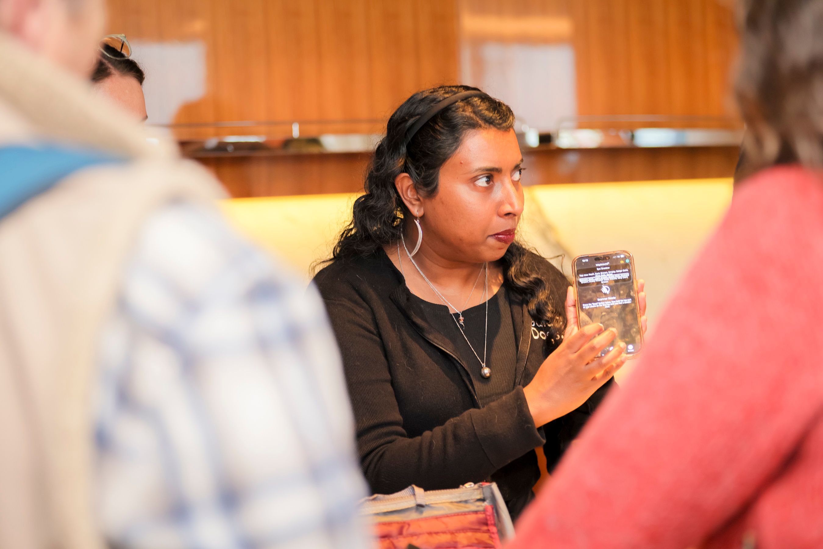 Abby demonstrating talkback on an iPhone.