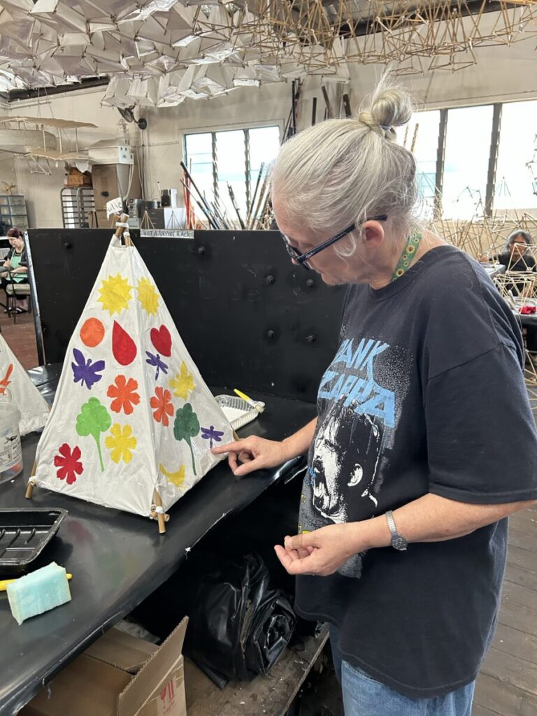 Julie constructing the lantern.