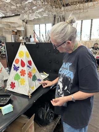 Julie constructing the lantern.