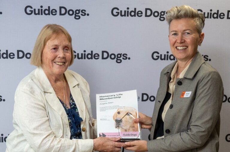 Angela standing next to Chair Jacqui Jones.