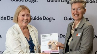 Angela standing next to Chair Jacqui Jones.