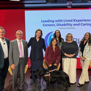Group photo of Westpac staff with Andy and her Guide Dog.
