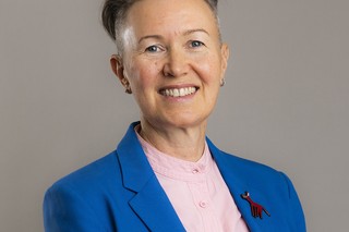 Jacqui Jones smiling at the camera.