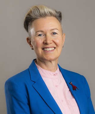 Jacquie Jones smiling.