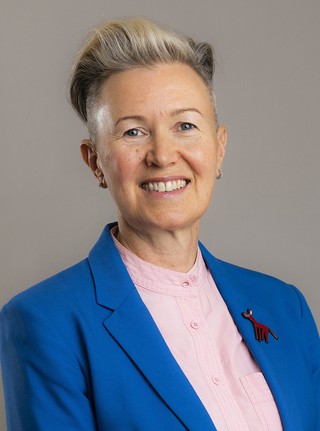 Jacquie Jones smiling.