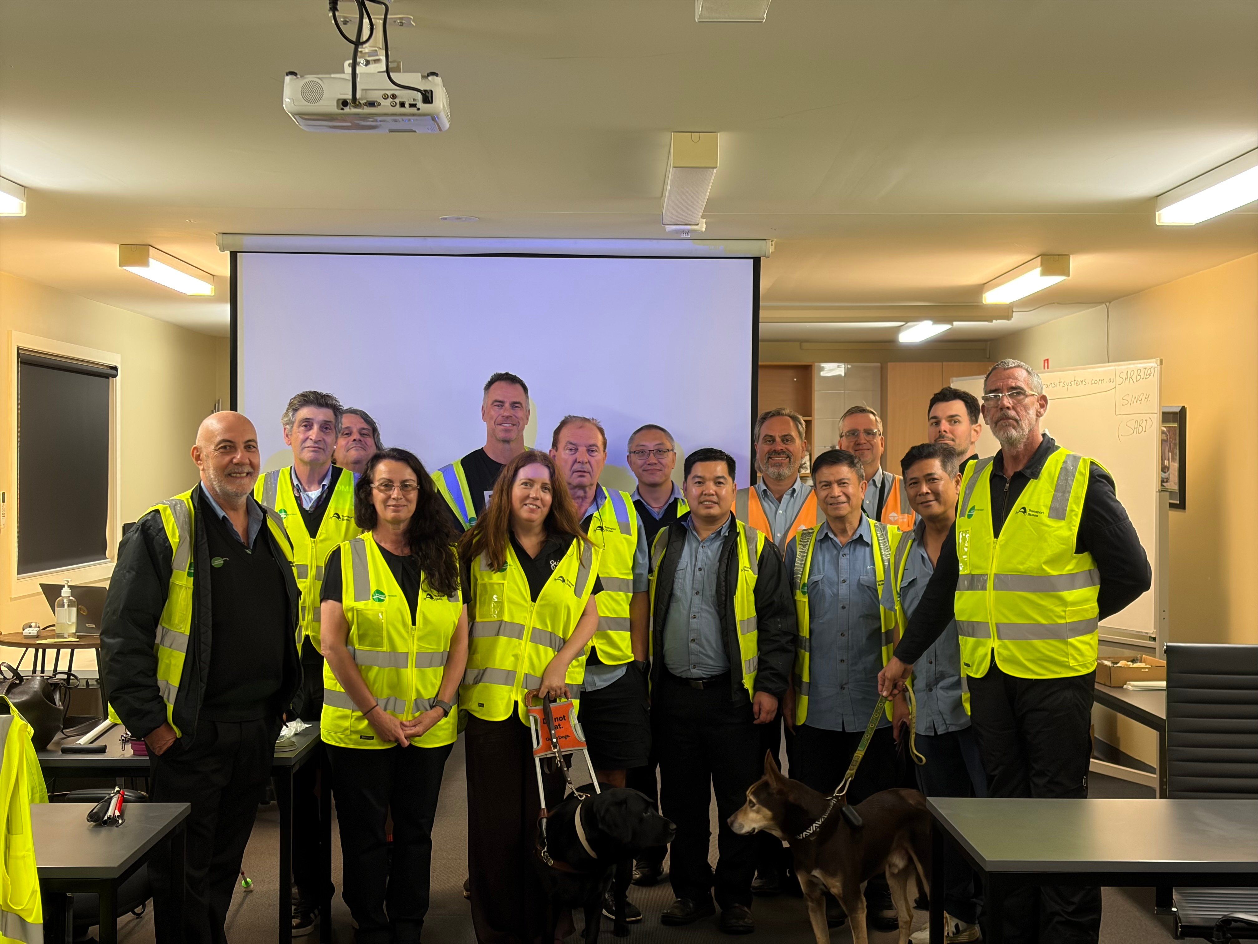 A Group photo of Guide Dogs staff and Transit Systems.