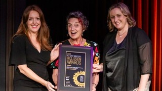 Tamara Searant and Di Shaddock standing with an award recipient.