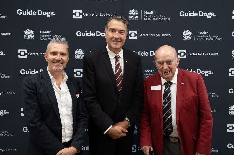 Doug Cameron standing with Dale Cleaver and James Mueke at the Cameron Centre.