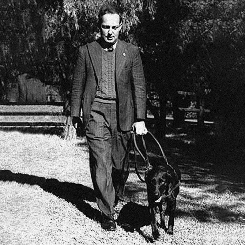 Arnold cook walking with Guide Dog Dreena.