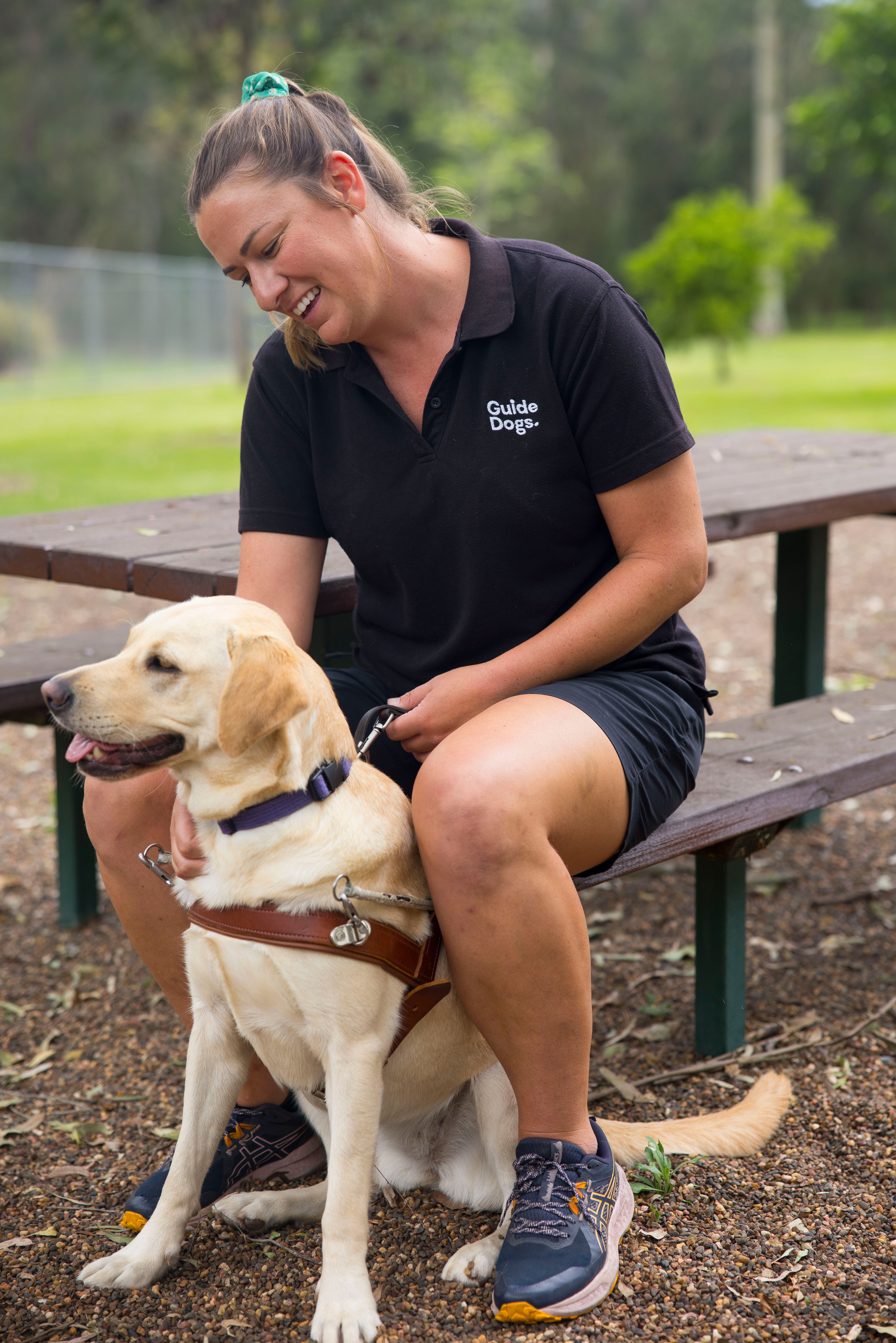 A Trainer with a Guide Dog.