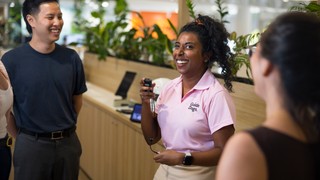 Assistive Technology Specialist Abby showing assistive technology.