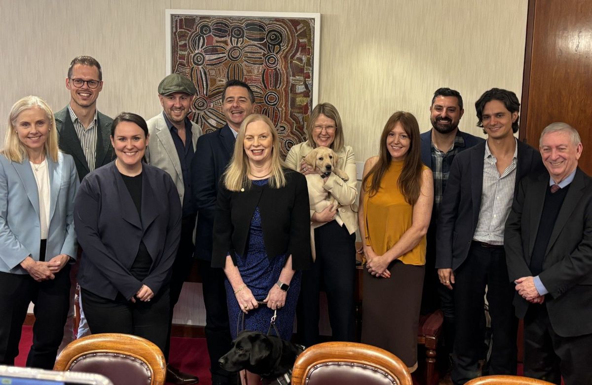 Group photo of attendees and staff for the seminar.