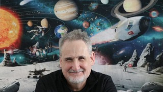 Garry smiling at the camera.