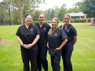 A group of staff members standing together.