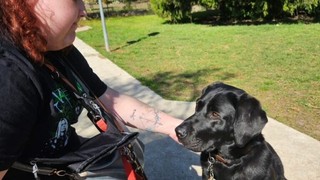 Abbie with her Guide Dog Zita.