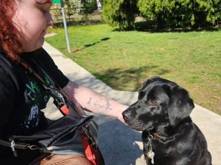 Abbie with her Guide Dog Zita.