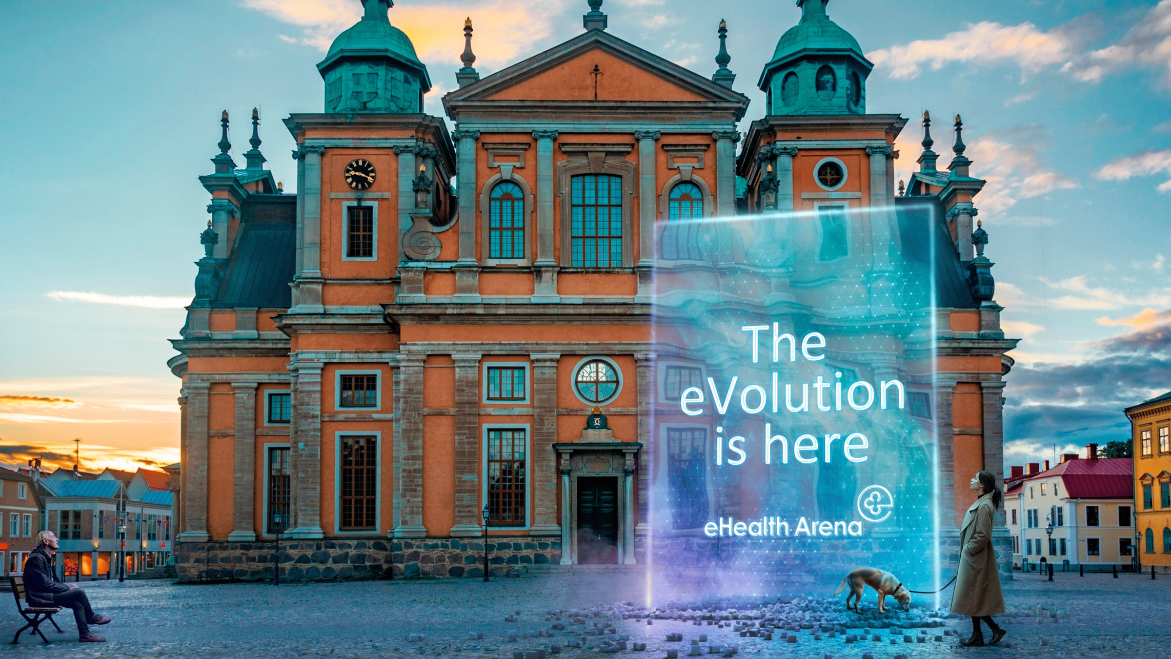 Skylt med texten "The eVolution is here" som har dimpt ner framför domkyrkan i Kalmar 