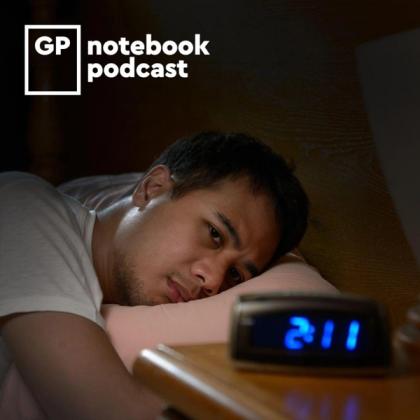 Man lying in bed looking at a digital clock showing 2:11 AM, with the GP notebook podcast logo in the corner.