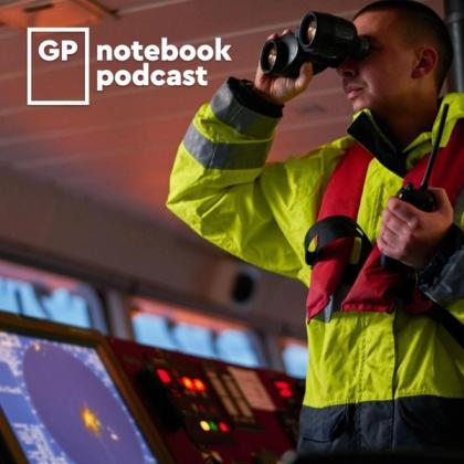 Man in high visibility jacket using binoculars on a ship's bridge with navigation screens in the background, and GP notebook podcast logo in the upper left corner.