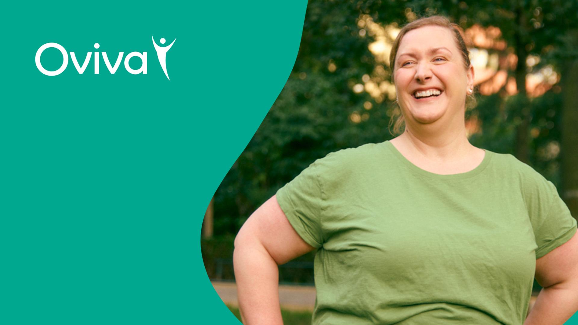 A laughing woman in a green t-shirt outdoors, with the Oviva logo.
