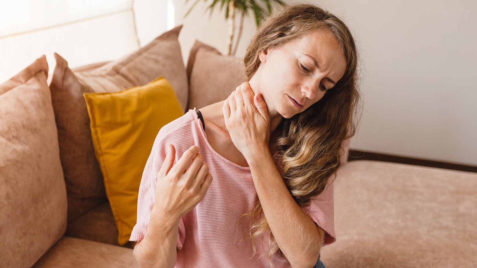 Woman with neck and shoulder pain.