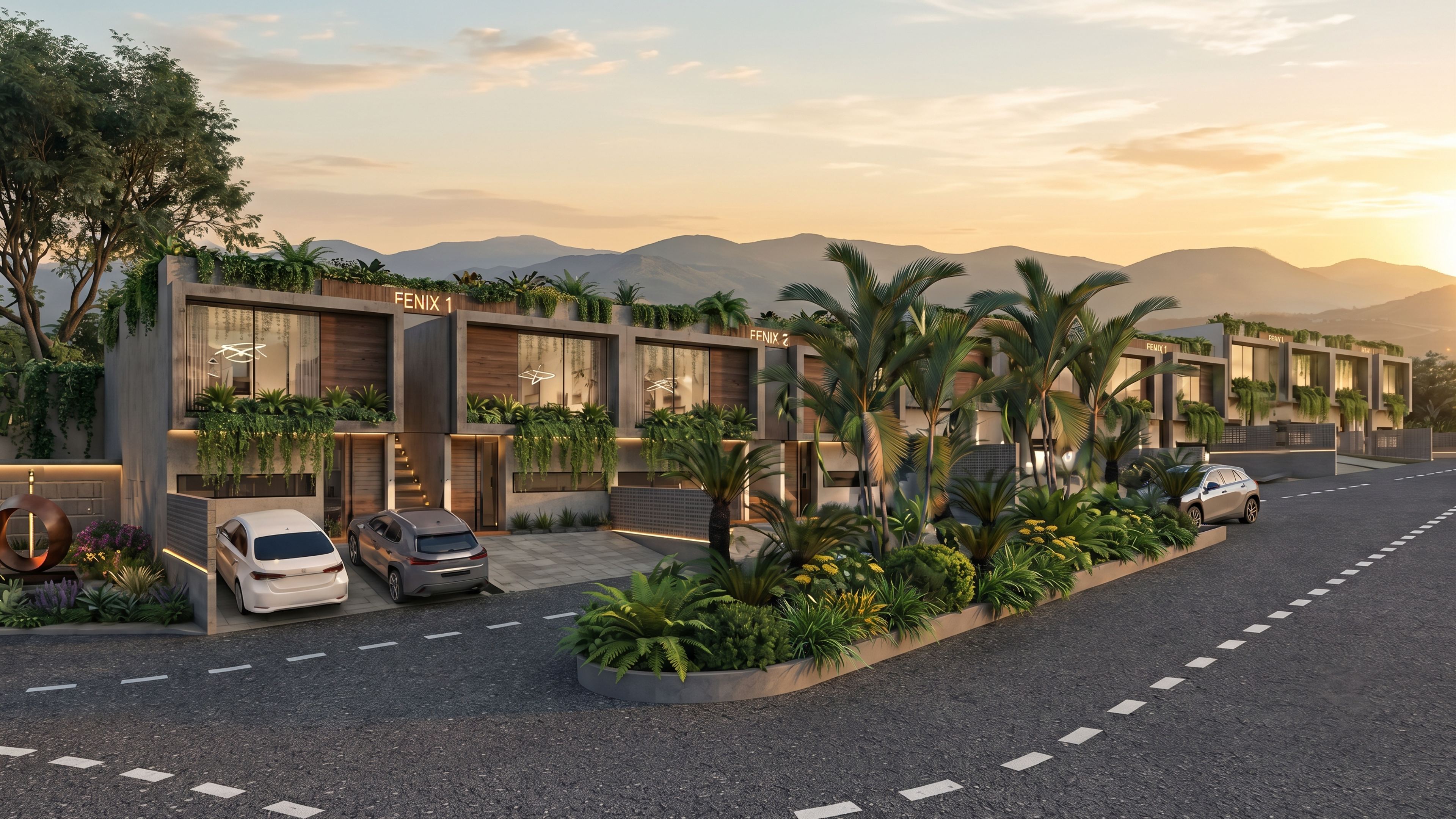 Fachada de Town House FÉNIX al atardecer, con montañas al fondo