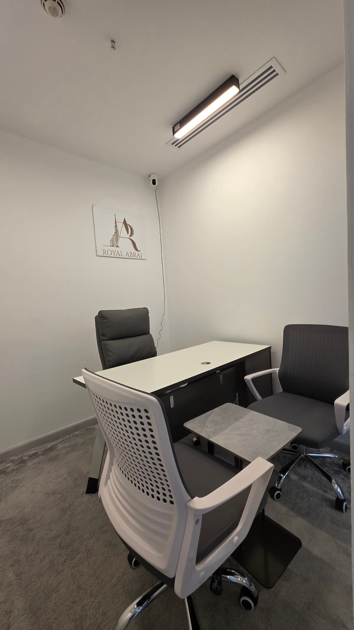 Private meeting room at Royal Abraj Group used for confidential document preparation