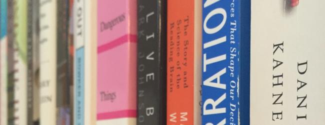 Close up of book spines on a shelf