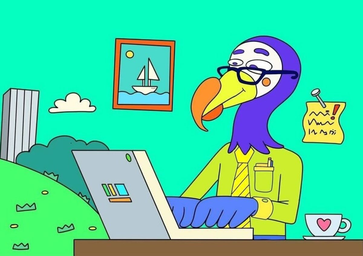 Happy dodo bird working on the laptop.