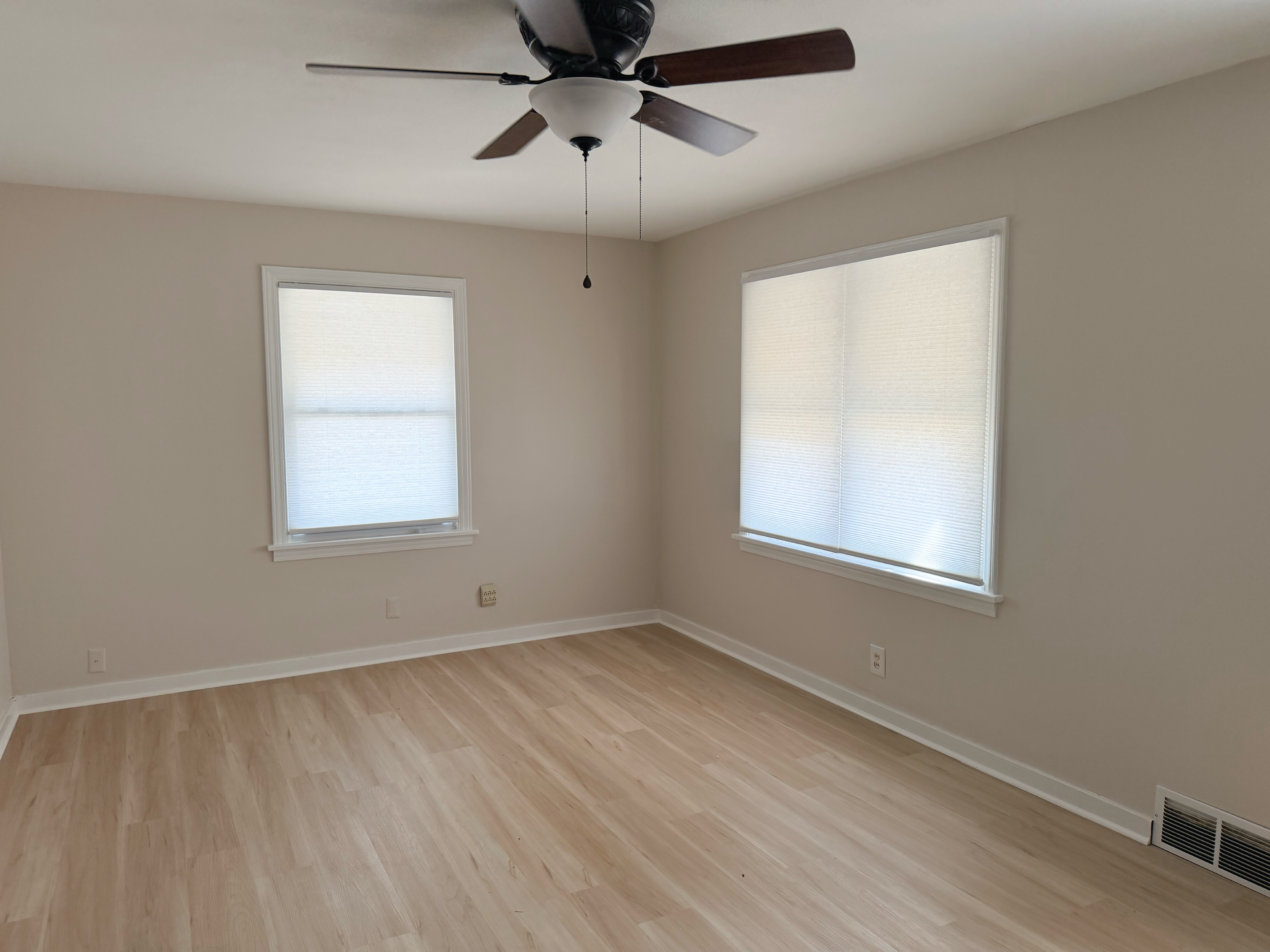 Residential home's living room repair and repaint.