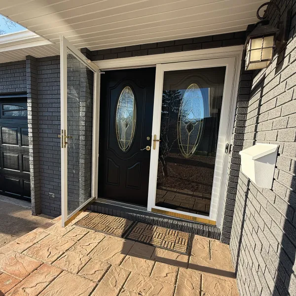 Exterior home after image of a front door repainted.