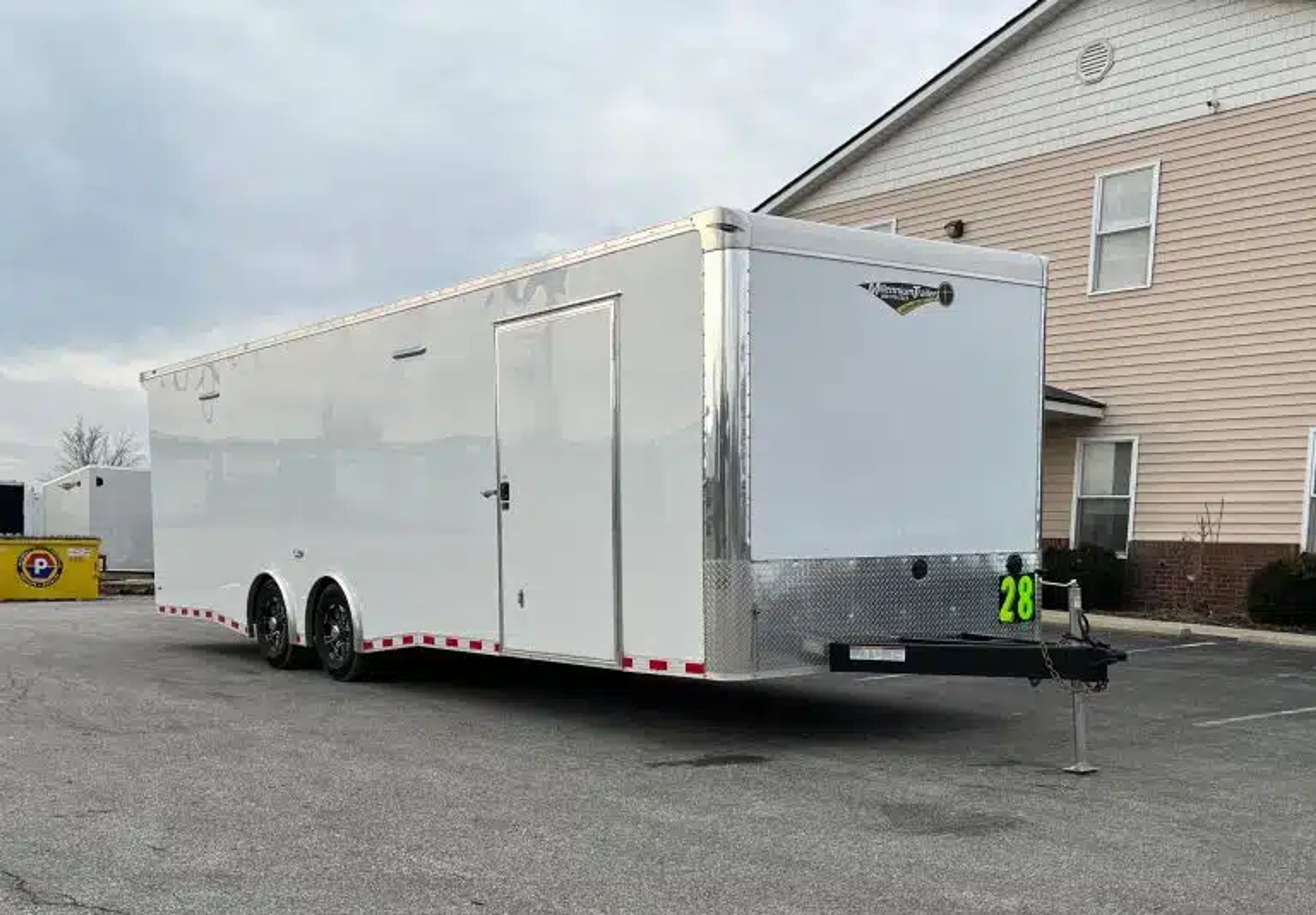 Enclosed Car Hauler 2026 28ft. Extreme w/6K Torsion Spread Axles, Finished