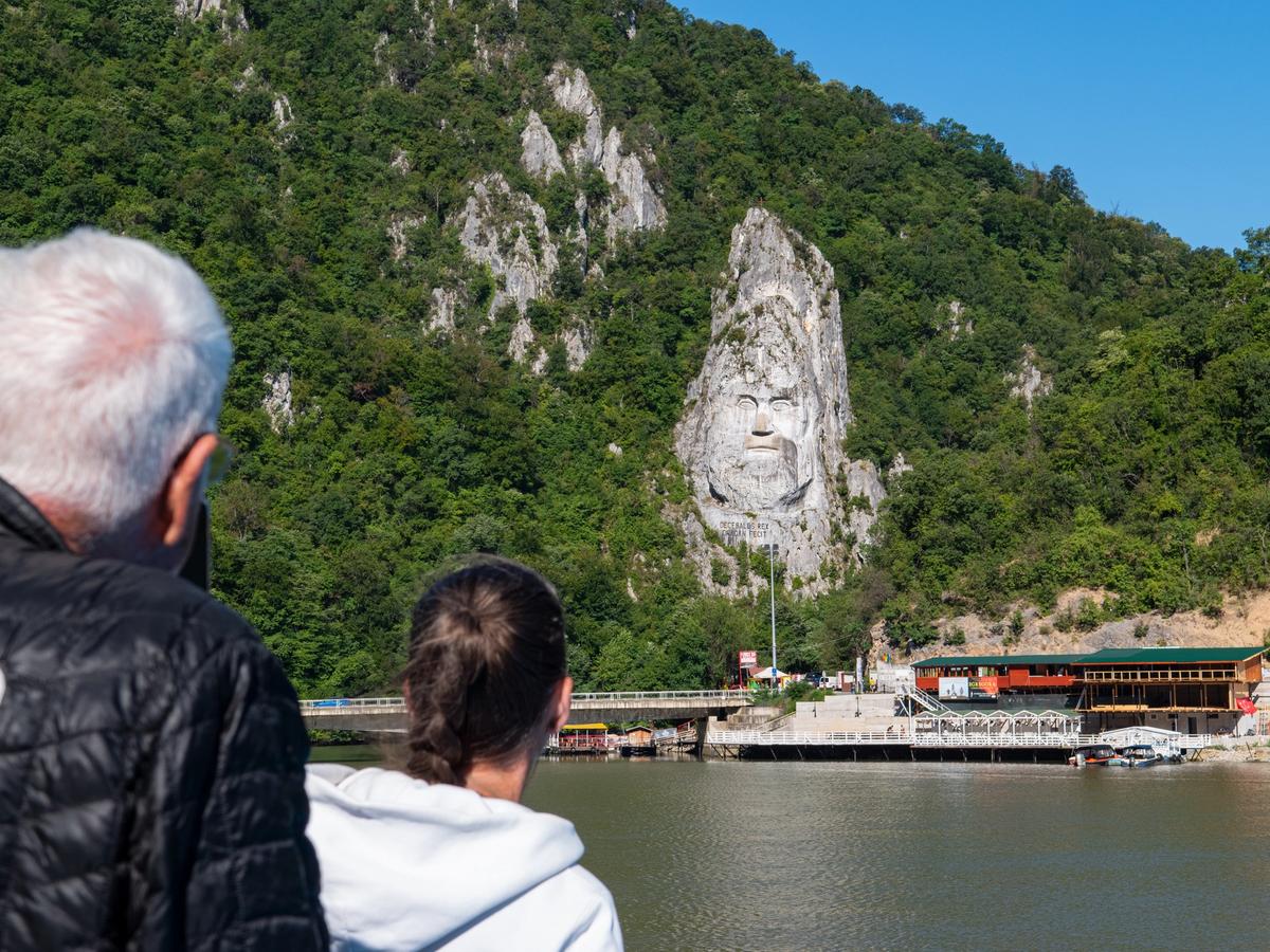 the Rock Sculpture of Decebalus, a massive carving of the face of the last king of Dacia, Decebalus, located on the Danube River in Romania