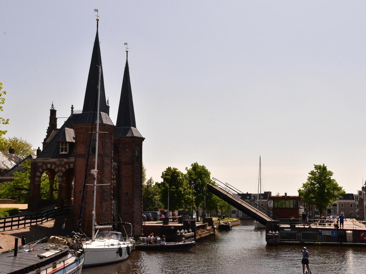 the Waterpoort (Watergate) in Sneek, Netherlands. This iconic water gate is a significant historical landmark and symbol of Sneek, located in the province of Friesland