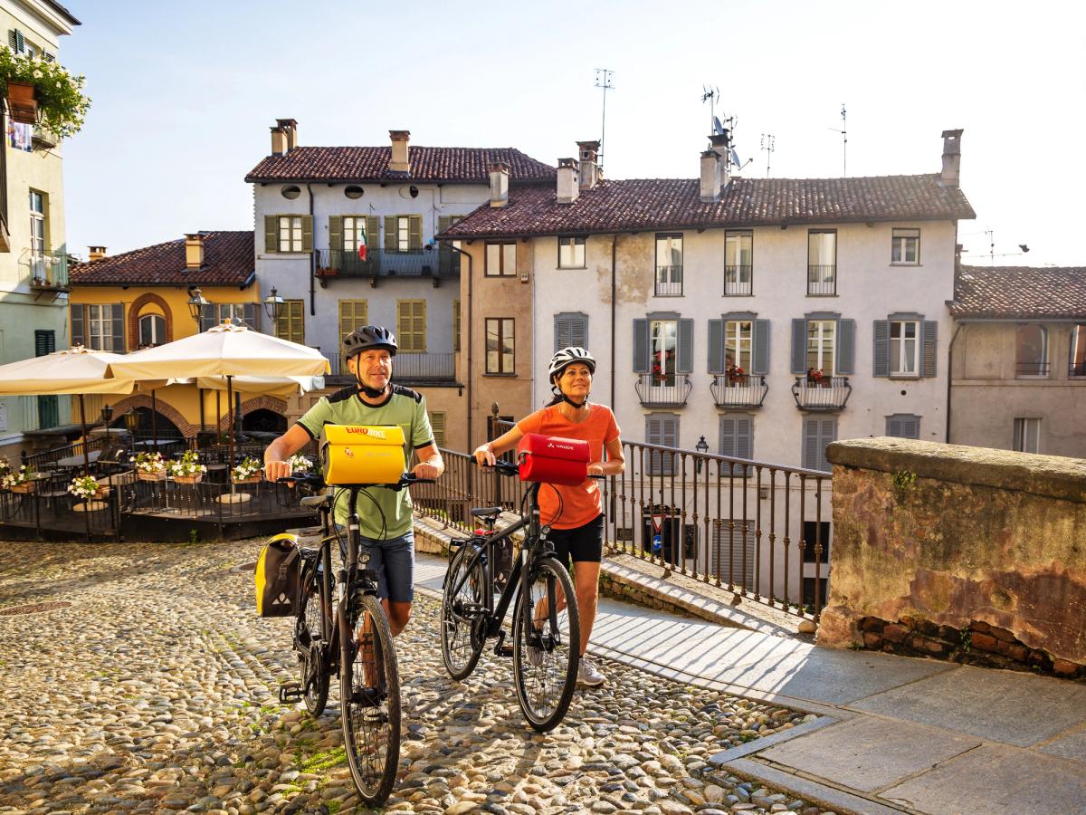 Walking the bikes through Saluzzo town