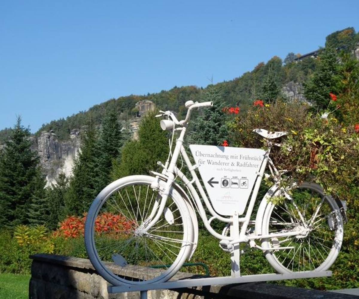 German Hotel sign welcoming cyclists