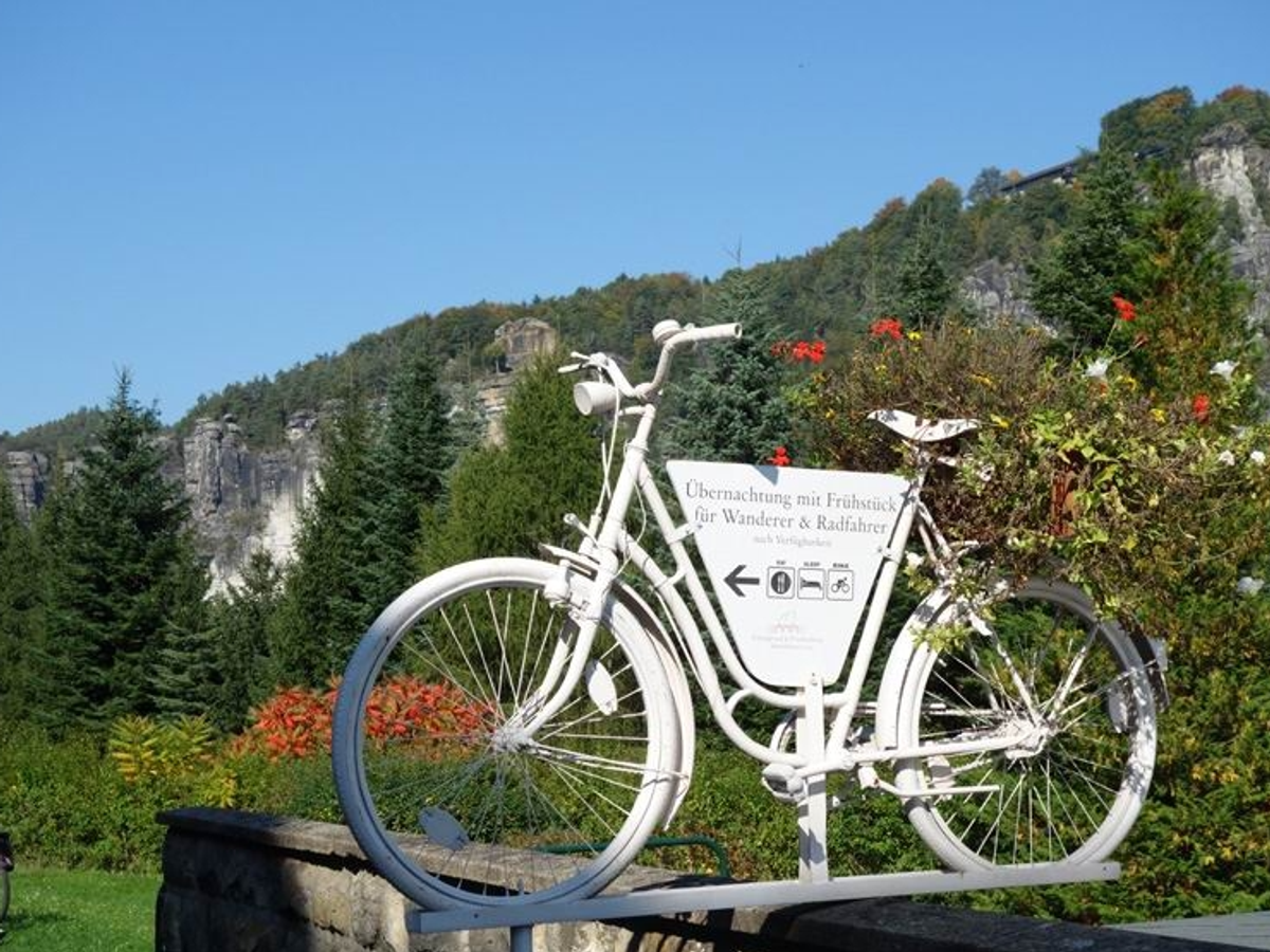 German Hotel sign welcoming cyclists