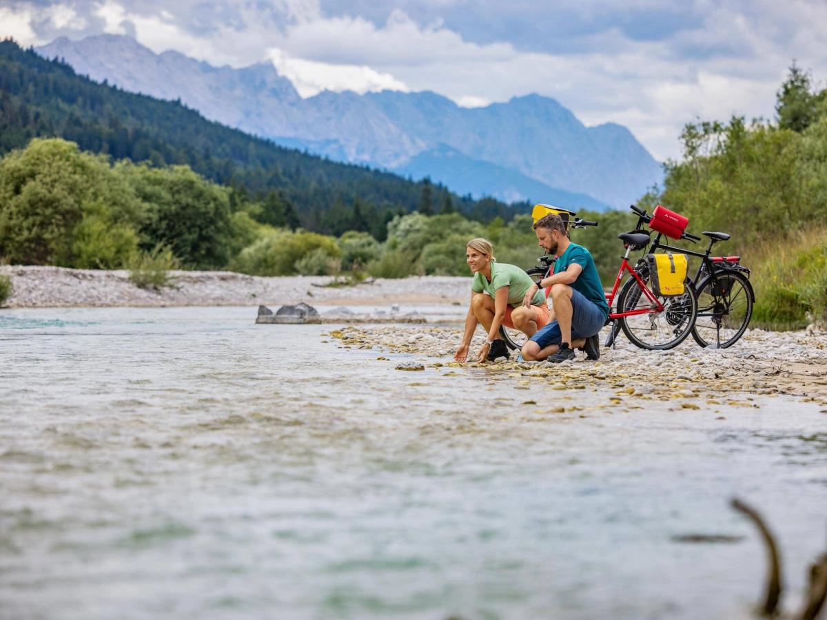 Resting on the banks of the River Lech on a Cycling Holiday